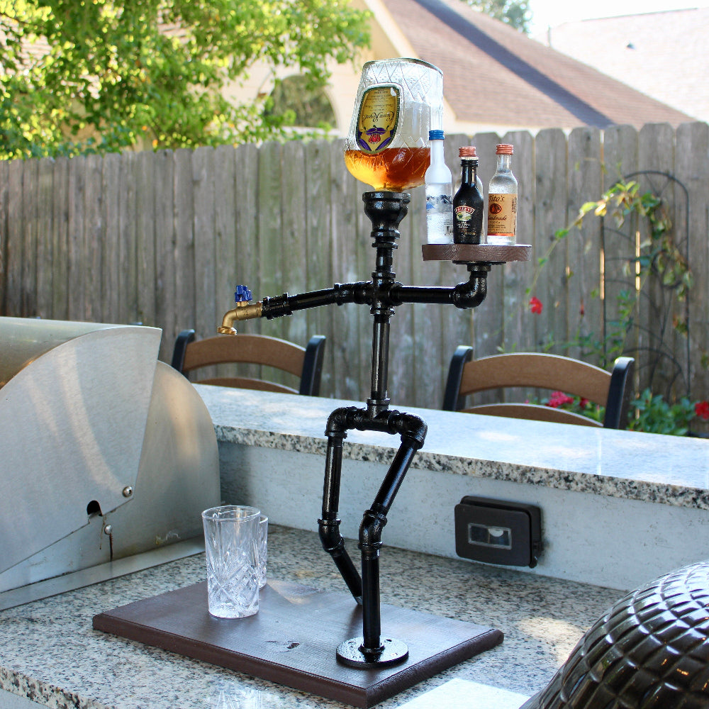 Person-shaped bottle holder with drinks on a patio table
