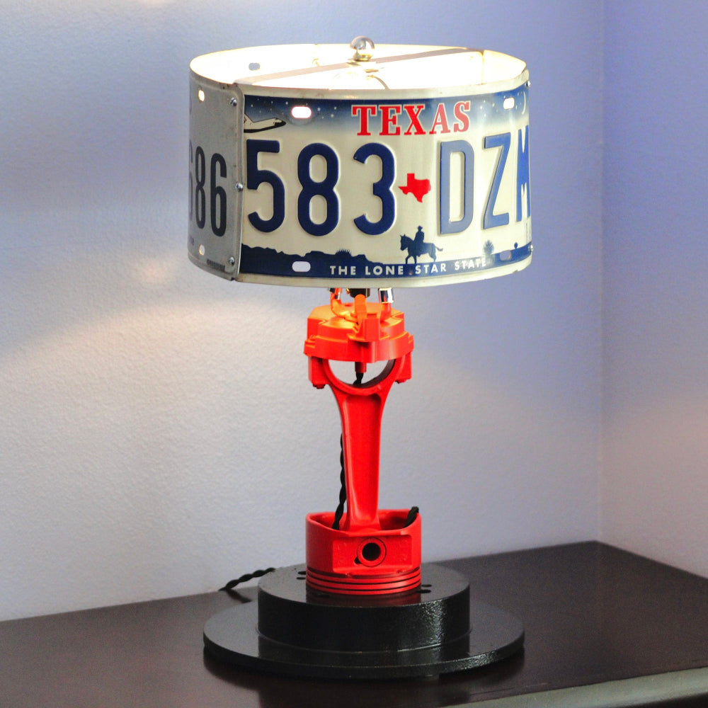 Table lamp with Texas license plate shade on a white background