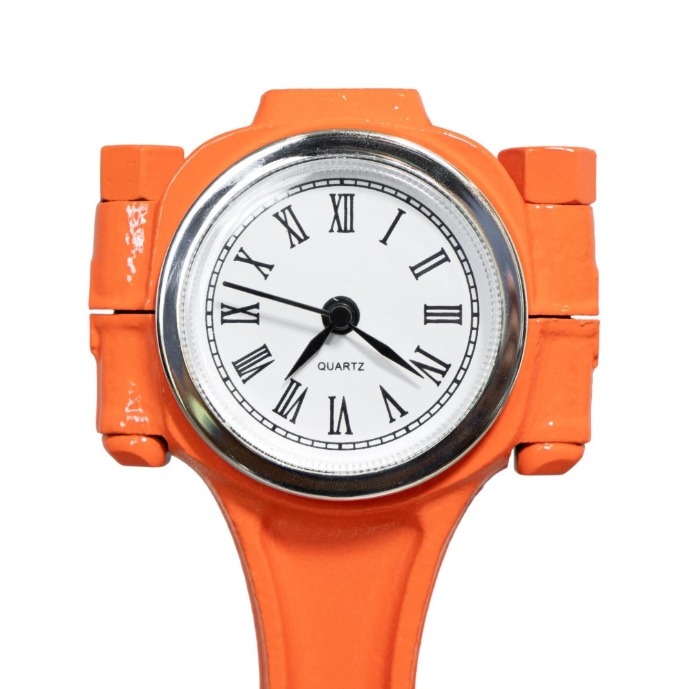 Orange wristwatch with a white face and black hands on a white background