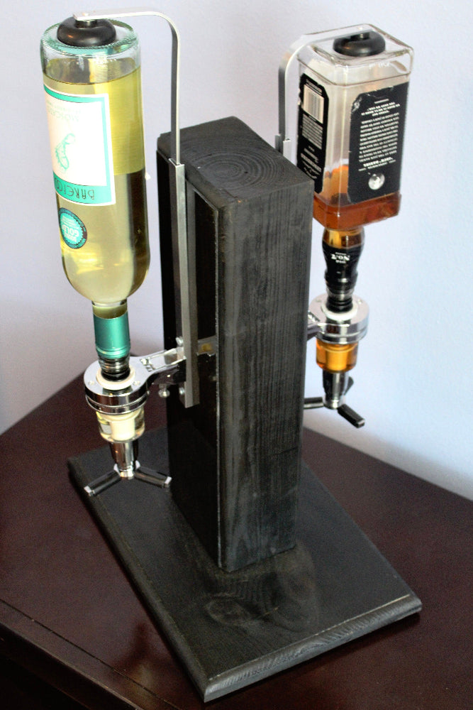 Bottle filler stand with two bottles on a wooden surface