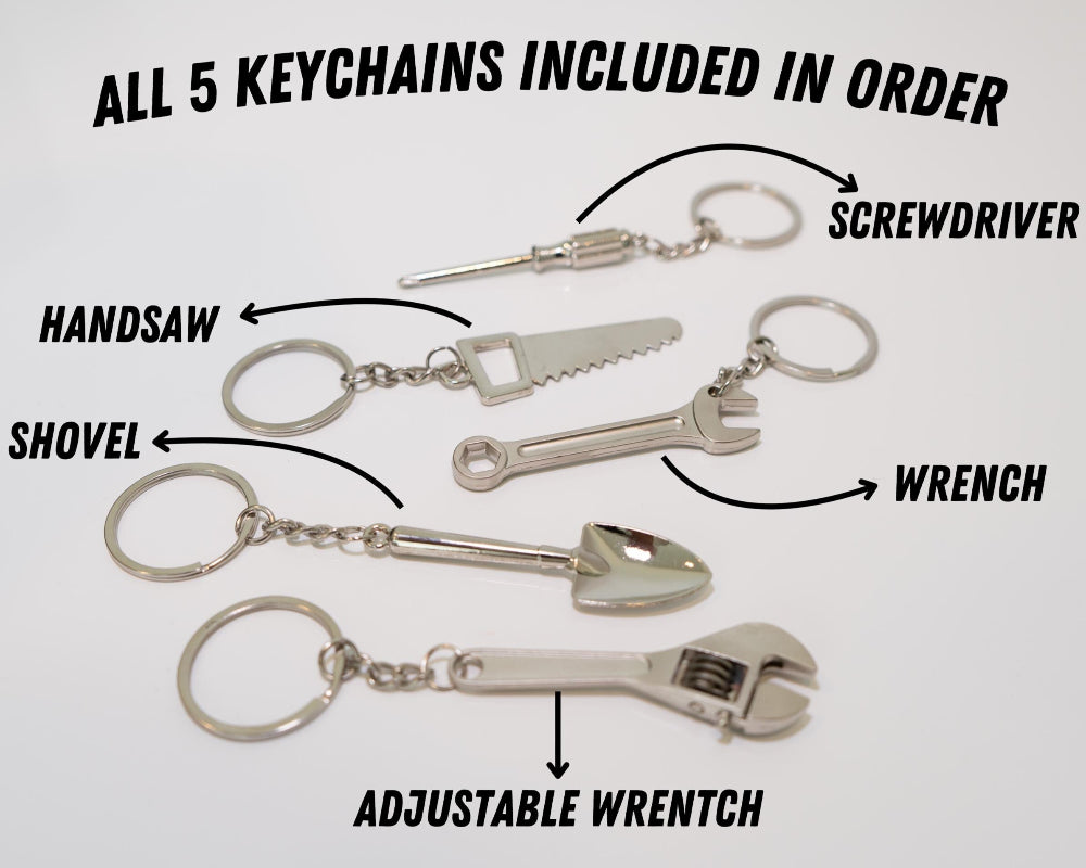 Set of five keychains with tool designs on a white background