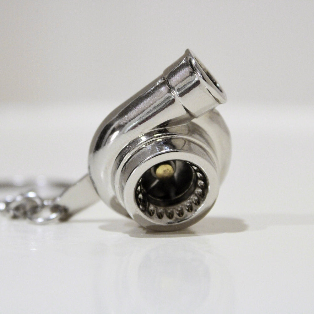 Turbocharger keychain on a white background