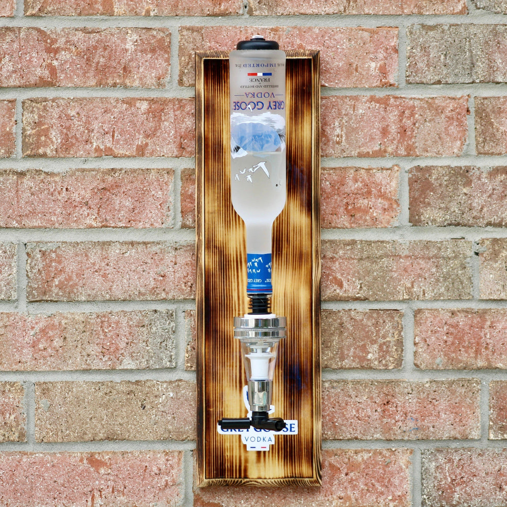 Wooden wall-mounted bottle opener with a water bottle on a brick wall background