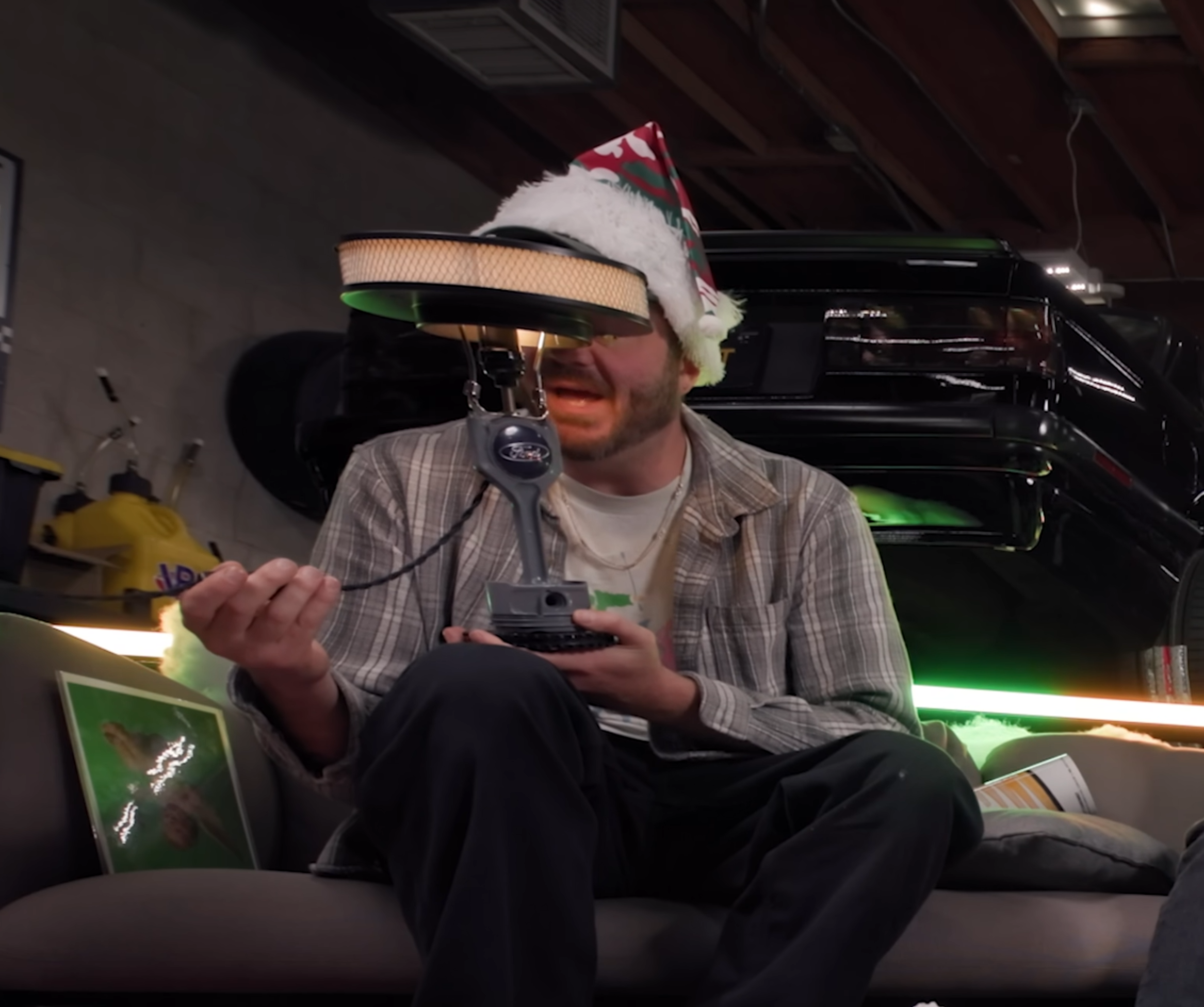 Donut Media YouTube thumbnail for "Ranking the Best & Worst Presents for Car People" featuring two hosts holding a gift-wrapped automotive tool, with 1.2 million views.