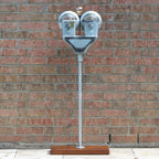 1960s parking meter floor lamp that preserves original details while serving as bold retro lighting.