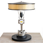 Vintage-style lamp with a unique design on a wooden surface