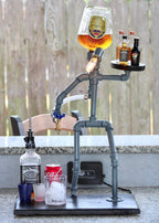 Barbell with glass of beer and bottles on a patio