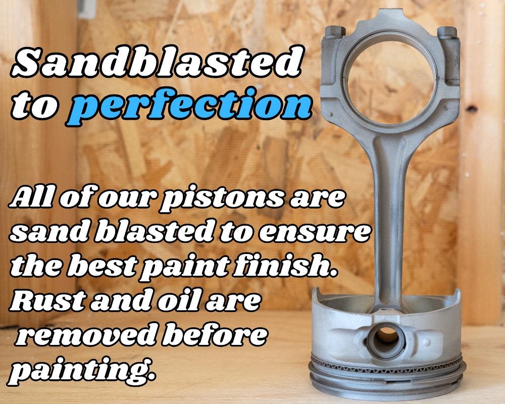 Metal piston on a wooden surface with sandblasting text overlay