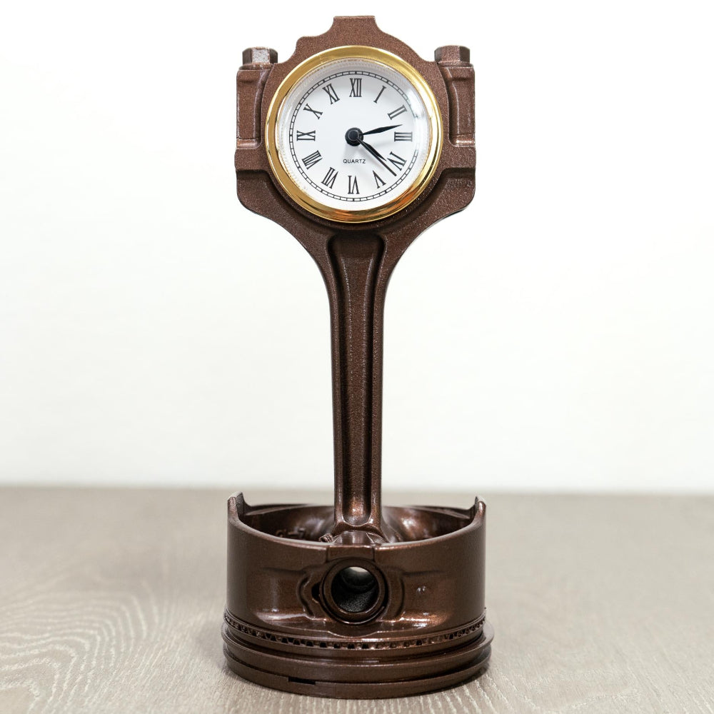 Decorative clock with a unique design on a white background