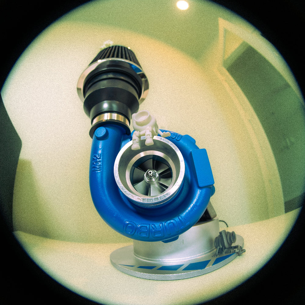 Turbocharger with blue and silver design on a white background