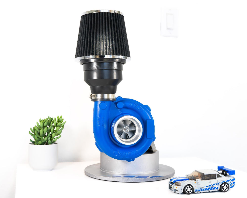 Turbocharger with a black and blue design on a white background