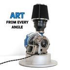 Turbocharger on a white background with 'ART FROM EVERY ANGLE' text
