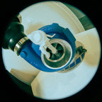 Close-up of a blue and green valve on a white background