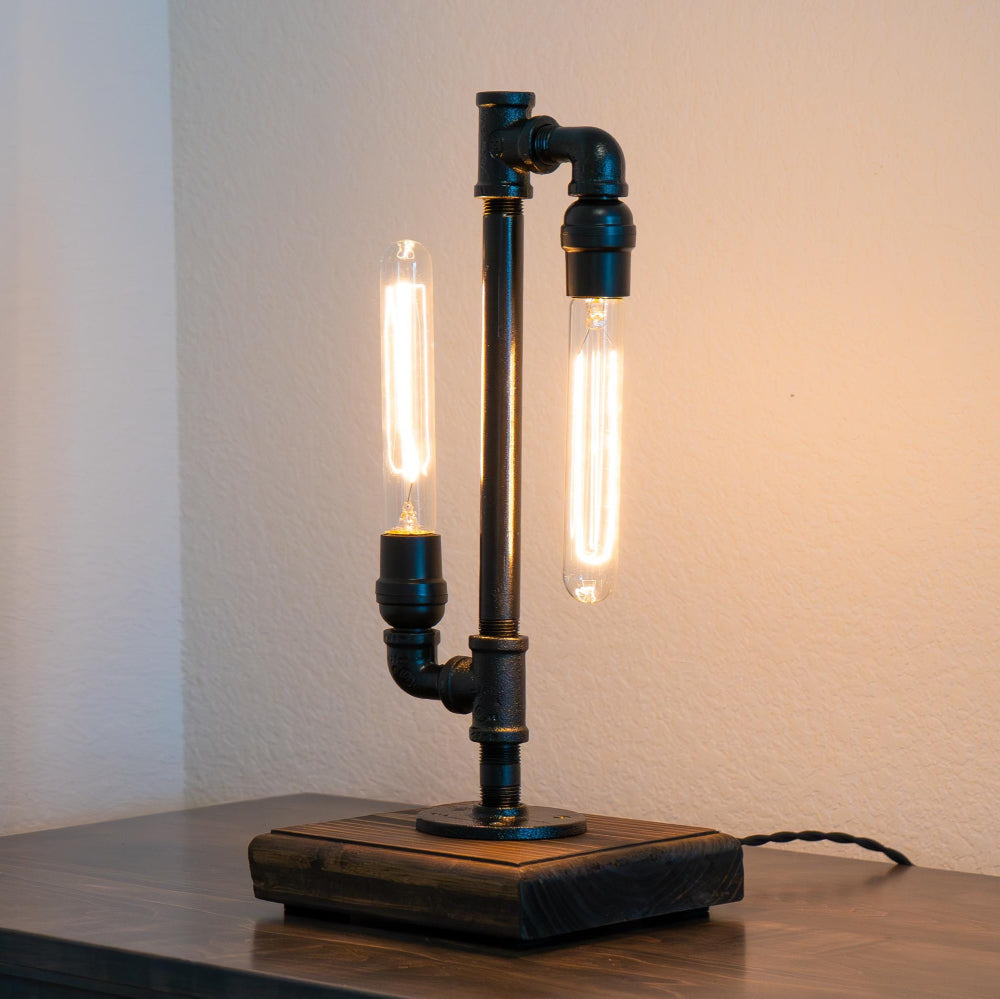 Table lamp with industrial design on a wooden surface