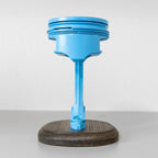 Blue cylindrical object on a white background