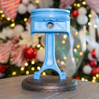 Blue decorative item on a stand with a festive background
