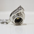 Turbocharger keychain on a white background