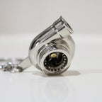 Turbocharger keychain on a white background
