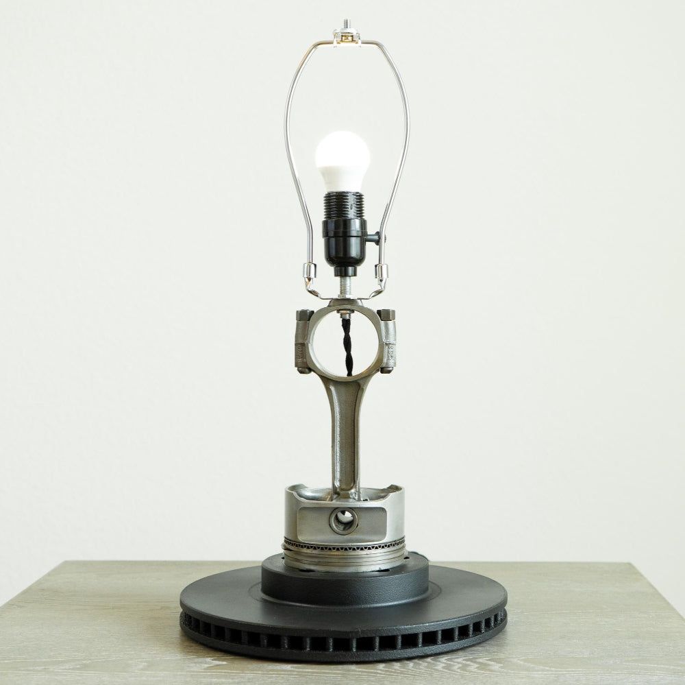 Unique Chevy V8 piston lamp handcrafted from genuine engine components with unique character.