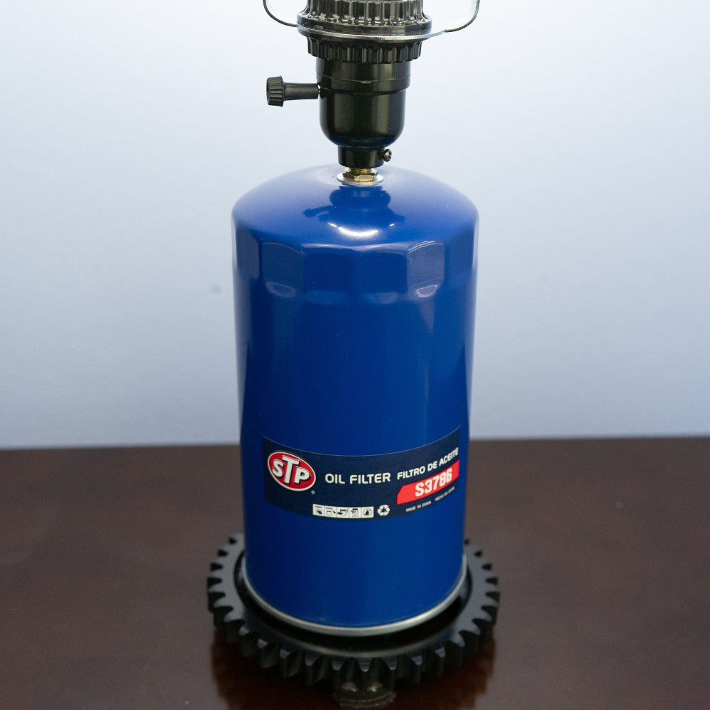 Unique STP oil filter lamp handcrafted from genuine automotive components.