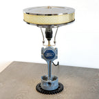 Automotive Ford piston table lamp crafted from a real engine piston, designed for subtle but unmistakable Ford decor.