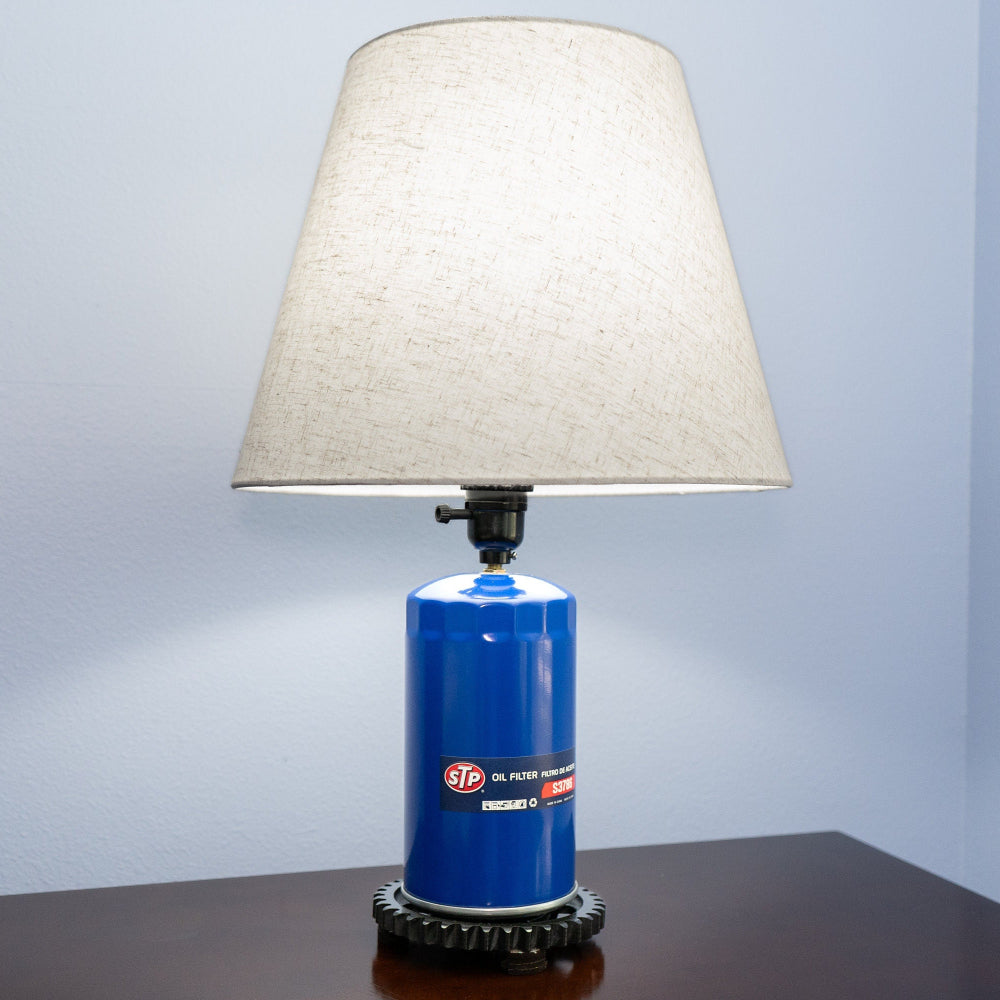 Automotive oil filter light made from real parts, offering functional lighting with classic muscle car appeal.