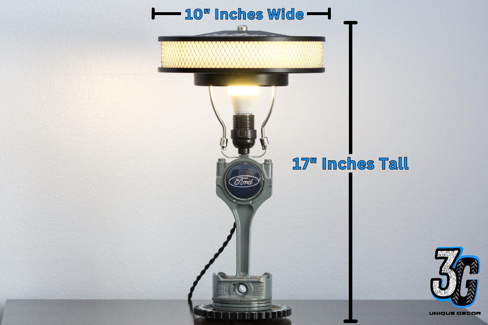 Automotive piston lamp made from real car parts, showcasing durable metal construction and authentic mechanical character.