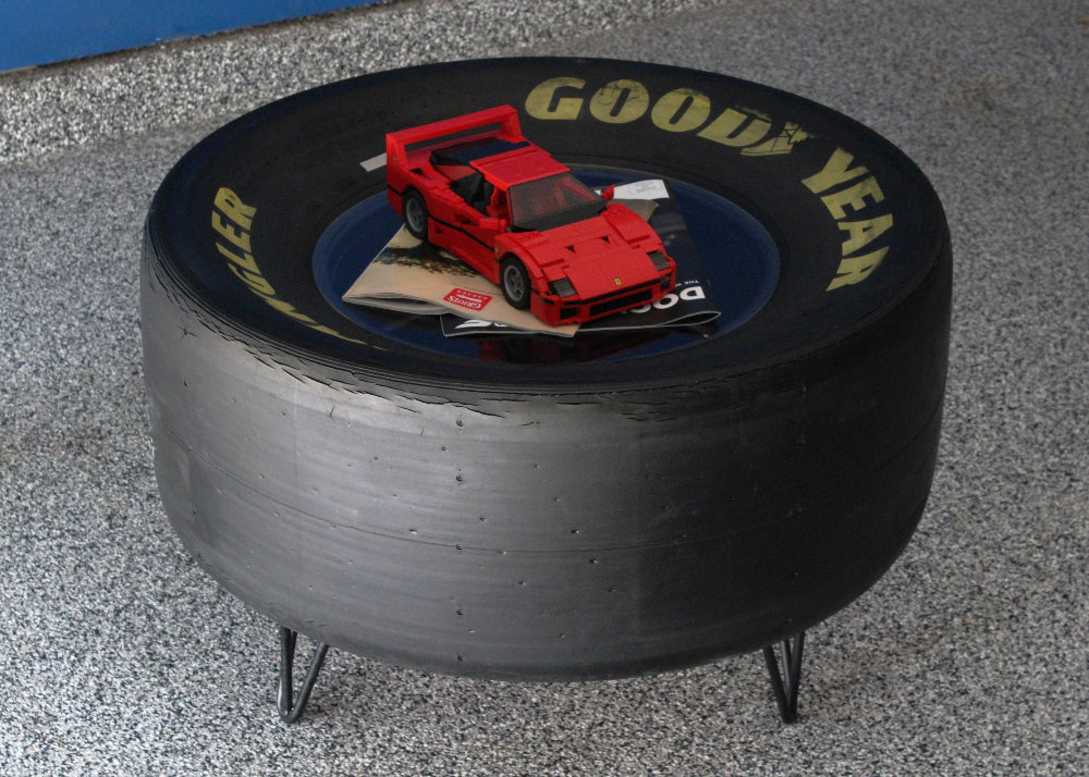 Automotive racing coffee table handcrafted from genuine motorsports components.