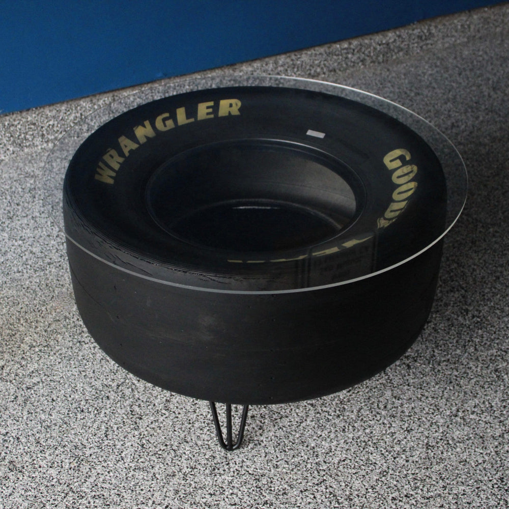 unique NASCAR tire coffee table made from a real Goodyear race tire, offering authentic racing character.