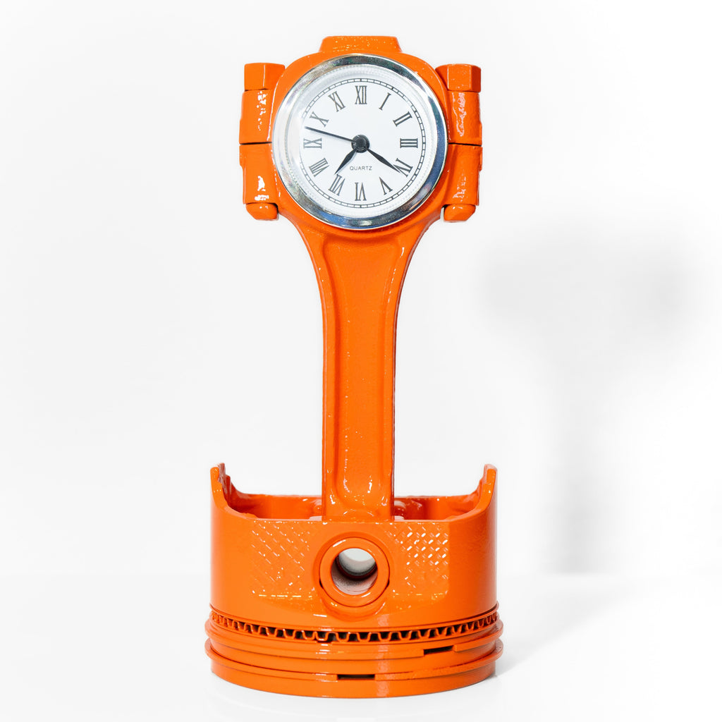 Chevy V8 piston clock made from real engine piston with integrated time display for automotive desk decor.