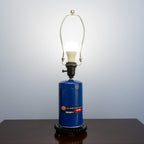 Classic car parts lamp made from an STP oil filter and industrial gear base.