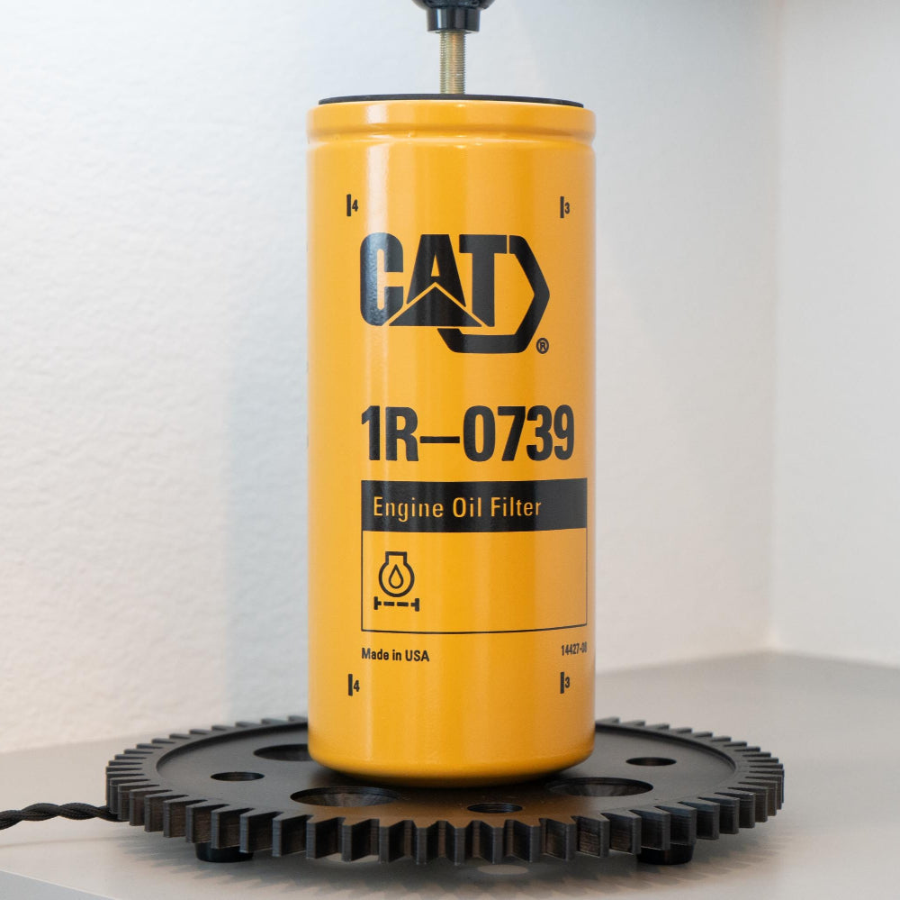 CAT oil filter lamp styled for construction offices, mechanic shops, and industrial workspaces.