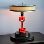 Custom piston lamp made from real car parts, designed as statement automotive decor for desks, nightstands, garages, or offices.