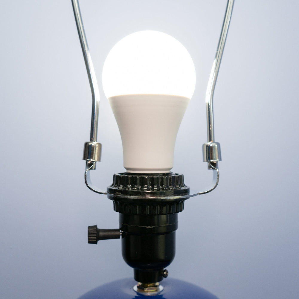 Desk sized STP oil filter lamp designed to fit naturally in offices, garages, and workspaces.