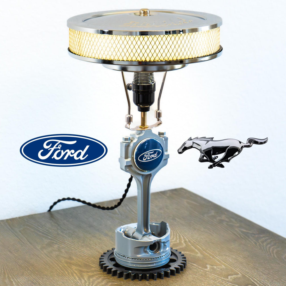 Ford piston lamp made from a real V8 engine piston, featuring the original Ford logo and designed as authentic automotive lighting.