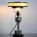 Chevy piston lamp designed for garage decor, handcrafted from real automotive components with bold mechanical appeal.