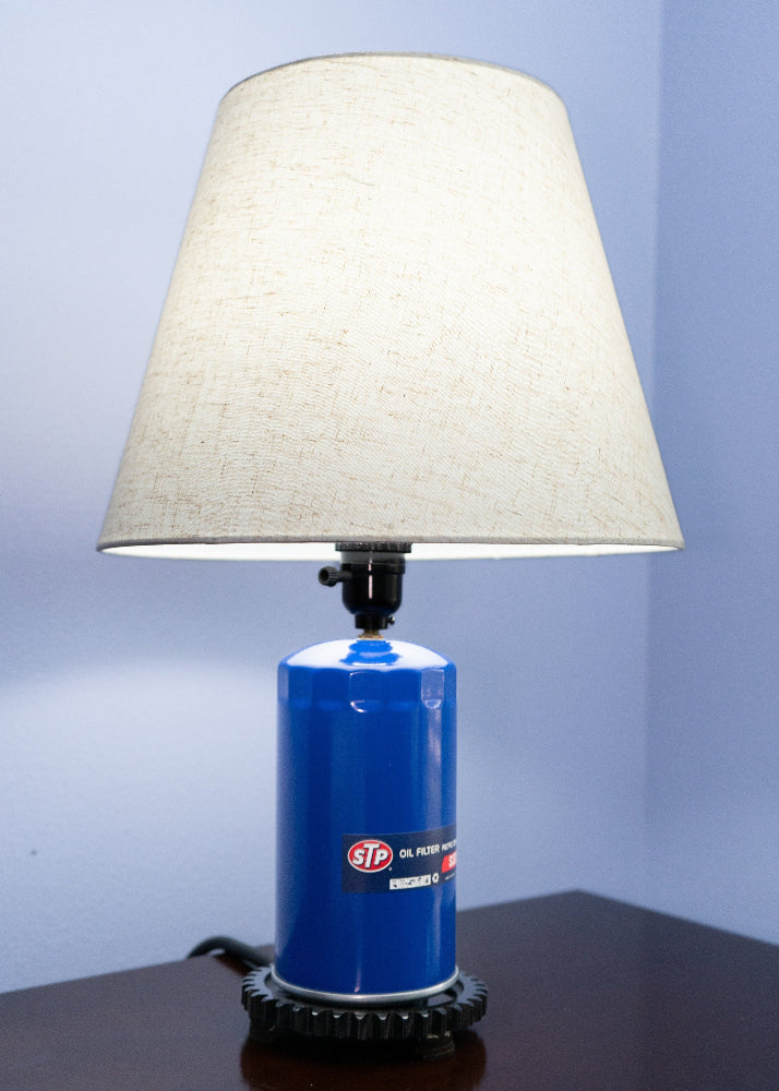 Garage ready STP oil filter lamp built for car lovers, mechanics, and automotive themed spaces.