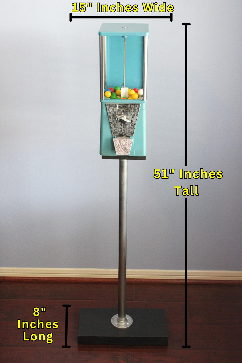 Astro gumball machine mounted on a custom industrial pipe stand, creating a sturdy and visually striking retro display piece.