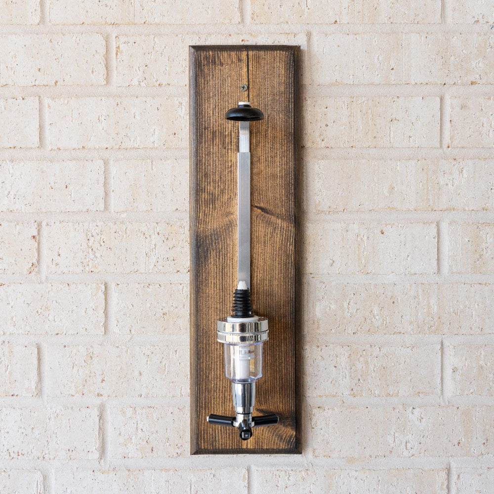 Handcrafted wood liquor dispenser built for everyday use and visual impact.