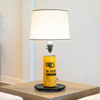 Heavy machinery oil filter lamp that blends authentic construction components with functional interior lighting.