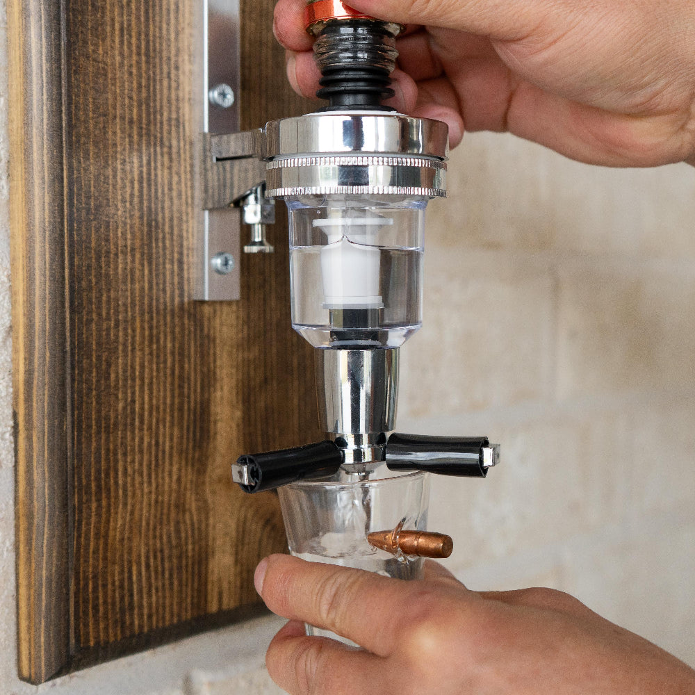 Home bar wall dispenser that keeps bottles organized while providing smooth controlled pours.