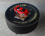 NASCAR table built from a real race tire for garages and man cave spaces.