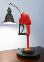 Mechanic style gas pump lamp made from an authentic fuel nozzle and repurposed automotive components.