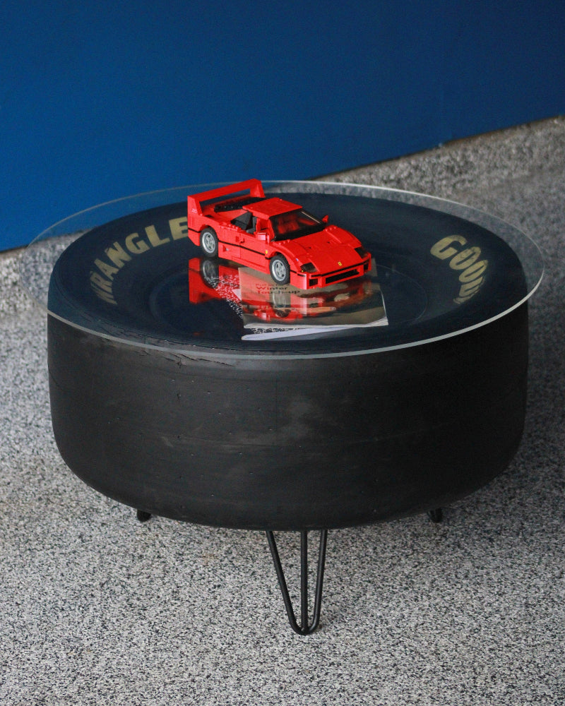 Motorsports display table made from authentic race used tire.
