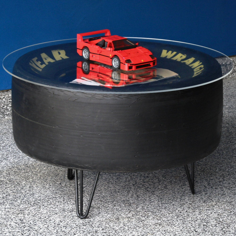 NASCAR tire coffee table made from a real Goodyear racing tire with durable tabletop surface.