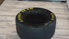 3G Unique Decor handcrafted Goodyear Eagle racing tire coffee table with round glass top display.
