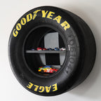 Racing tire wall storage shelf designed for garages man caves and motorsports collections.