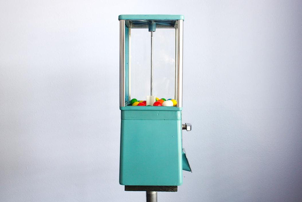 Retro Astro gumball machine used as decorative candy home decor, perfect for offices, game rooms, or collector displays.