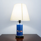 STP filter lamp crafted from a genuine oil filter and upcycled gear base.