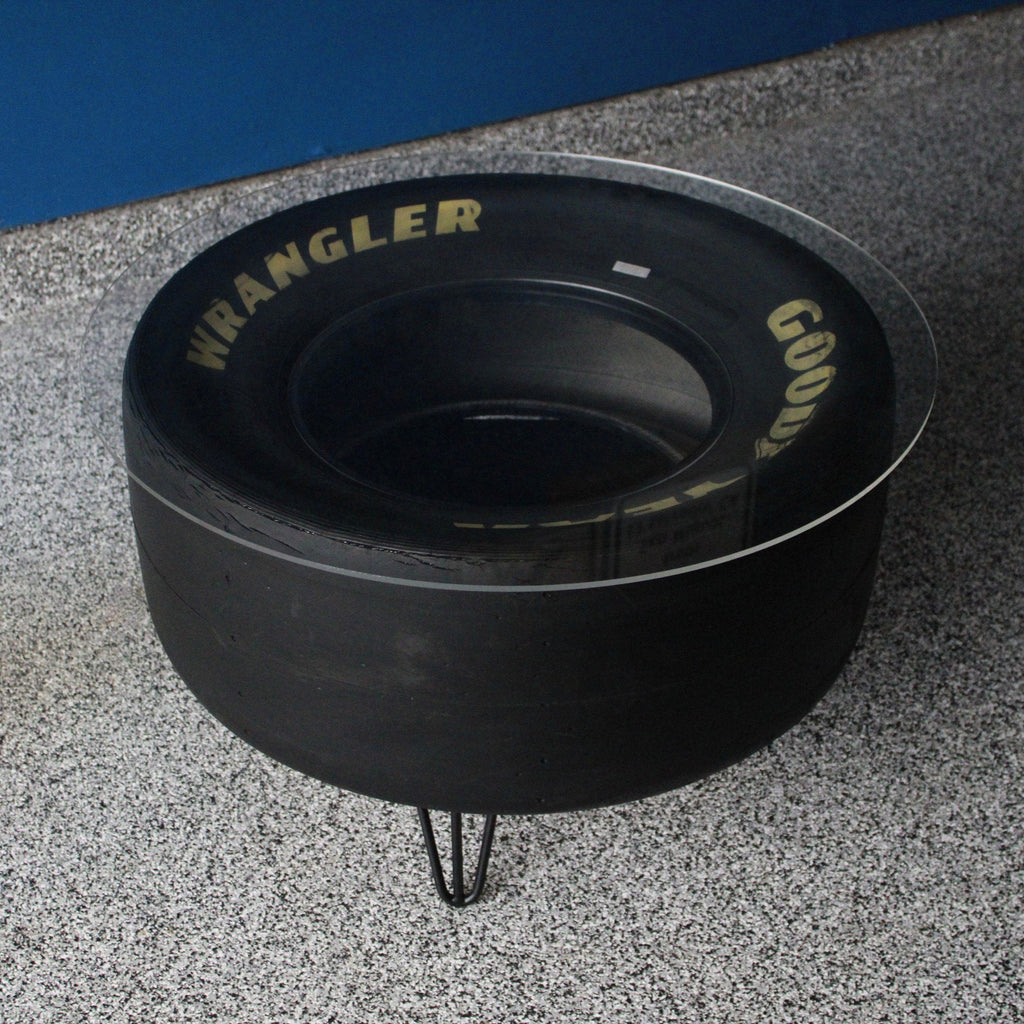 Handcrafted NASCAR tire table made individually from real racing components.